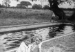 Raymond Johnson and cousin by the paddling pool