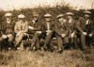 Villagers watching a cricket match
