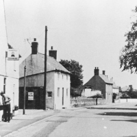 Plough and cottages main street 1930
